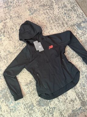 New Balance running Women’s Pro Team Elite Rain Jacket Size Small 25/26